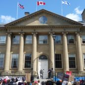 The crowd urged the Nova Scotia government to shift resources away from fossil fuel extraction and focus on conservation and renewable energy.