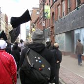 Marching past vacant buildings on Barrington