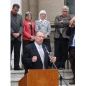 NDP MLA: Sid Prest talking to the crowd about his woodlot