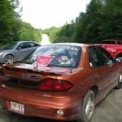 Cars block seismic trucks in Stanley, NB on August 9, 2011. Photo: Tracy Glynn.