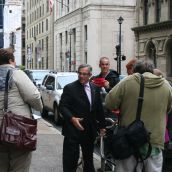 Protesters confront Clement on Hollis St. in Halifax.