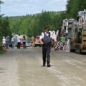 A RCMP officer calls in a mediator at around 4:00pm. Photo: Tracy Glynn.