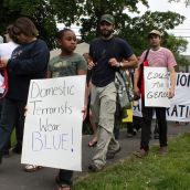 A young girl marches in the protest Saturday (Photo: Hilary Beaumont)