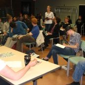 An audience member comments on the a panellist's speaking points. <br> Photo by Allan Bezanson.