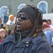 Ifo Ikeda reminded the crowd that they were standing on Mi'kmaq Territory and suggested the name of Occupy Nova Scotia change to Unoccupy Nova Scotia.   Photo: Lesley Thompson