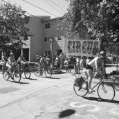 The naked bike ride gets lots of cheers from the PlaceMaking party.