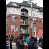 South End residents observe the protest march