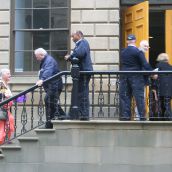 Anti-poverty advocate Ann Duffy presented a petition to commissionaires at Province House.  No politicians were to be found. Photo Robert Devet