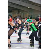 "Punchie Bruiser" trying to break through the pack of skaters