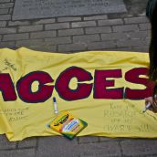 The banner that supporters took turns writing messages of choice