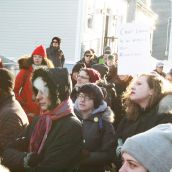 People listening to a spoken word piece.